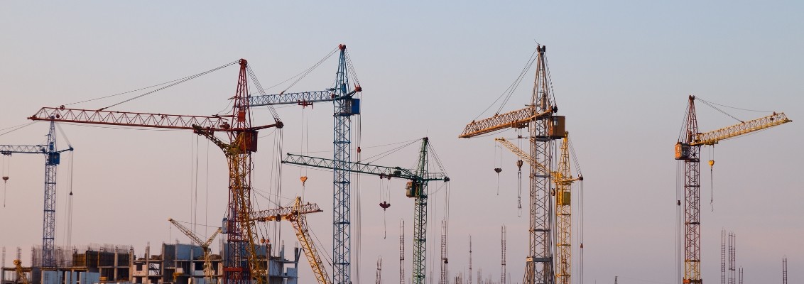 Group of cranes on construction site
