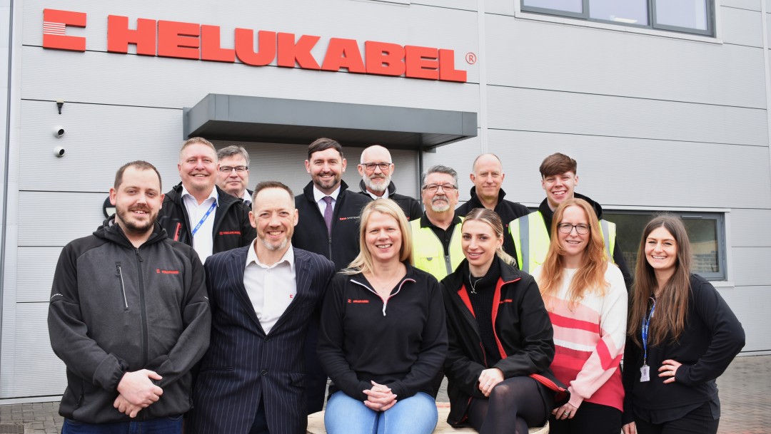 The 2024 HELUKABEL team photographed outside the UK offices with no photoshopped people at all because everyone could attend.